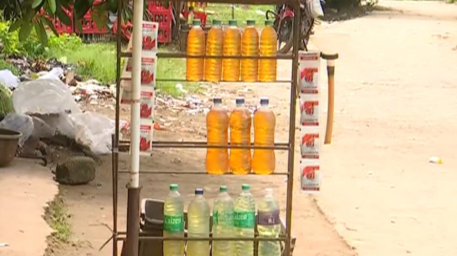What should I do if I see someone selling fuel in plastic bottles?